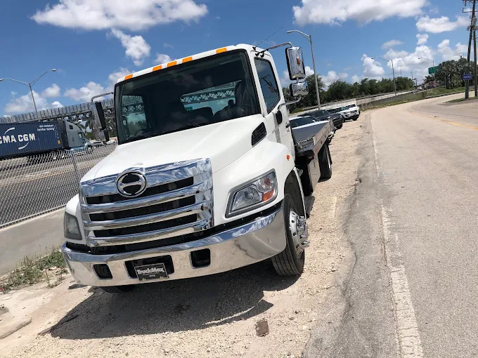 All About Towing flatbed tow truck